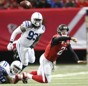 Atlanta Falcons quarterback Matt Ryan (2) tries to pass against the Indianapolis Colts during the first of an NFL football game, Sunday, Nov. 22, 2015, in Atlanta. (AP Photo/John Bazemore)